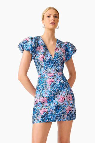 Elliatt Antheris Mini Dress in Blue Multi featuring a vibrant blue and pink floral print, romantic puff sleeves, fitted waist, and flattering mini silhouette.
