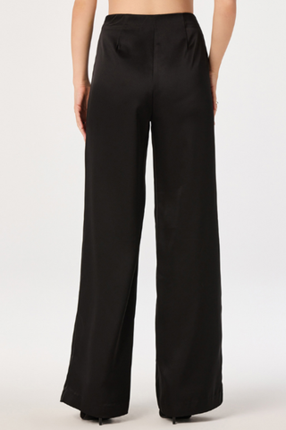 ASTR Ivana Pants in Black featuring a high-rise waist, full-length wide-leg silhouette, and fluid tailored fit.