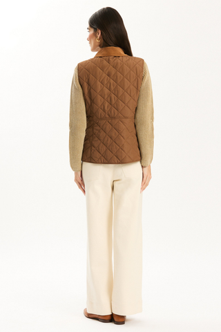 Tyler Boe Amoreena Vest in Bison brown featuring diamond quilting, a corduroy collar, snap-front closure, and patch pockets.