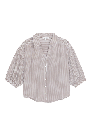 Model wearing the Nation LTD Jaynee Blouse in Praline Stripe, a lightweight striped button-front blouse featuring a relaxed fit, classic collar, three-quarter sleeves, and a breezy textured woven fabric.