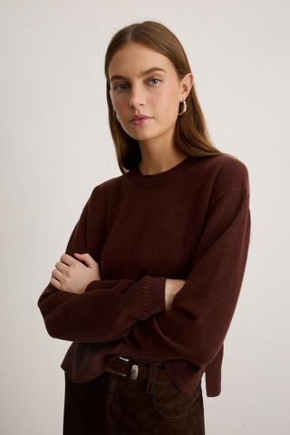 Tanya Taylor Lexia Cashmere Sweater in Deep Redwood featuring a classic crew neckline, long sleeves, and rich dark brown-red color.