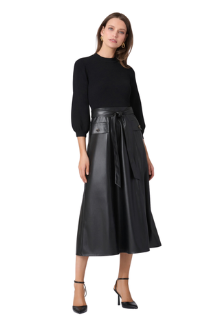 Shoshanna Aspen Dress in Jet featuring a fitted black knit bodice, three-quarter balloon sleeves, faux leather A-line midi skirt, and tie waist.