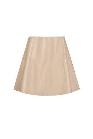 Marie Oliver Crawford Skirt in Oat featuring soft neutral vegan leather, a fitted high waist, pick-stitch detailing, and flared A-line mini silhouette.
