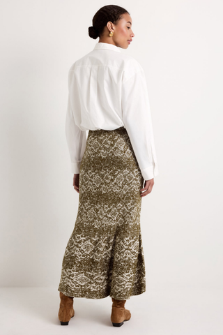 Marie Oliver Shiloh Skirt in Viper featuring an earthy snakeskin-inspired jacquard print, elastic waist, fitted silhouette, and flared midi hem.