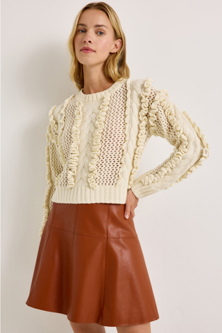 Lindsay Sweater in Ivory featuring a crew neckline, long sleeves, open knit texture, and dimensional ruffle detailing.