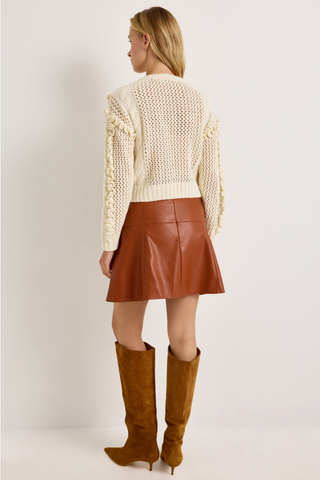 Lindsay Sweater in Ivory featuring a crew neckline, long sleeves, open knit texture, and dimensional ruffle detailing.