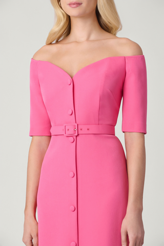 Shoshanna Cadence Dress in Snowberry pink featuring an off-the-shoulder neckline, fitted waist, and midi silhouette.