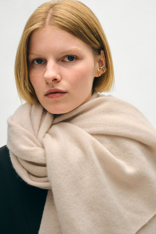 White + Warren Cashmere Travel Wrap styled as an oversized cashmere scarf.