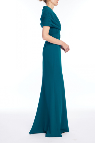 Badgley Mischka Cowl Neck Gown in teal featuring a draped neckline, fitted bodice, and sleek floor-length silhouette.