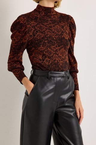 Marie Oliver Harlow Pant in Black featuring sleek vegan leather, a fitted waist, and modern barrel-leg silhouette.