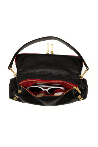 Hammitt Beverly Medium Handbag in black pebbled leather with brushed gold hardware and signature red zipper.