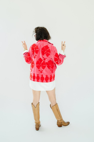 Eleanor James Brand Sgt. Pepper Crew Jacket in Cherrybomb red velvet with bold pink Suzani embroidery.