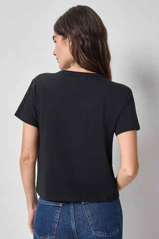Model wearing the Lilla P Organic Boxy Tee in Black featuring organic cotton jersey, a relaxed boxy fit, short sleeves, and a slightly cropped silhouette.