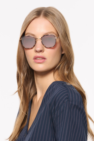 Krewe Peyton Sunglasses in Matte Black Fade featuring a rounded acetate frame, gold-tone metal details, and gradient lenses.