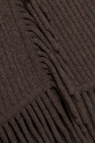 SIMKHAI Casey Midi Skirt in mushroom brown knit with a faux-wrap silhouette and fringe trim along the edge and hem.