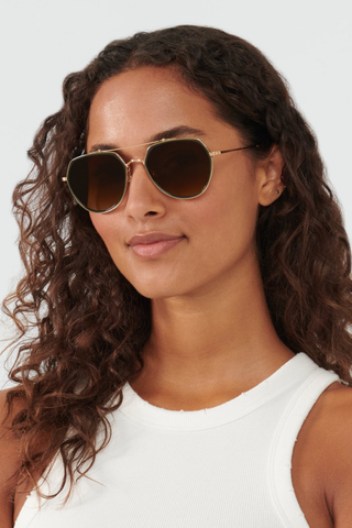 Krewe Baker Sunglasses in Bottle Green and Zulu featuring an oversized aviator frame, gold-tone hardware, and amber gradient lenses.