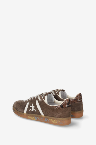 Premiata Bonnie-D 8576 Sneaker in rich brown with cream laces, signature logo detailing, and a low-profile sole.