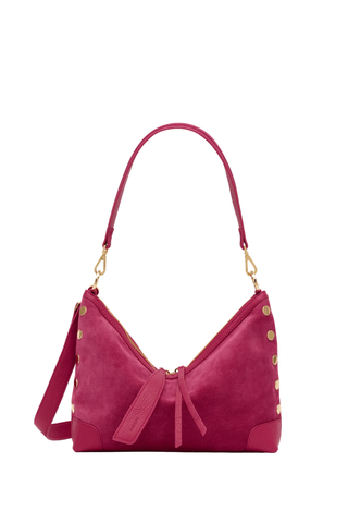 Pink handbag with gold accents on a white background