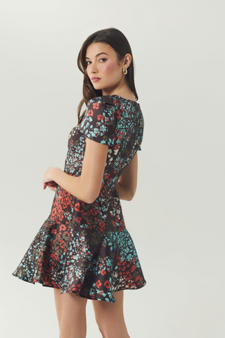 Hutch Lyons Dress in Brown/Multi featuring a floral print, fitted bodice, short sleeves, and flared mini skirt.