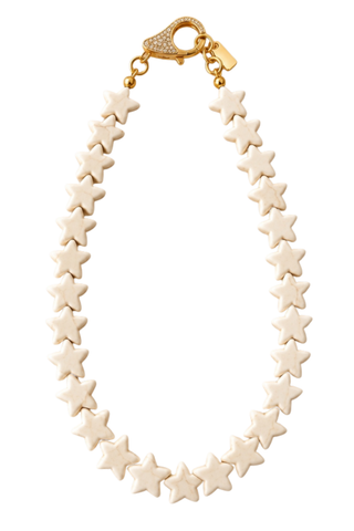Smith & Co. Design Large Sea Star Necklace in Coconut featuring oversized cream-colored star beads and a gold-plated lobster clasp.