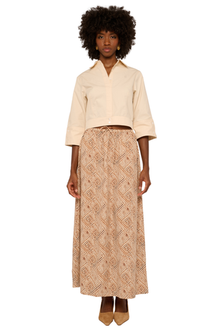 Love the Label Beckett Top in cream featuring a collared neckline, button front, cropped silhouette, and 3/4-length sleeves.