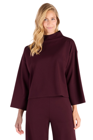 Jude Connally Marisa Top in Merlot featuring a relaxed silhouette, funnel neckline, and long sleeves.