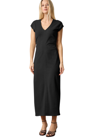 Black cap sleeve V-neck maxi dress with side tuck detail and back slit by Lilla P worn with strappy heels