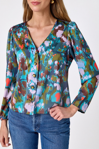 Crosby Jair Top in Florentine Marble featuring a multicolor abstract print, V-neckline, and long sleeves.