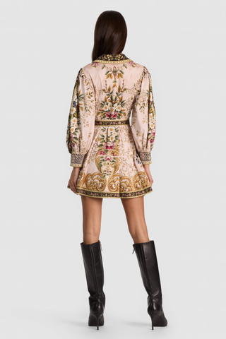 Alice + Olivia Lucy Mini Shirt Dress in True Grandeur featuring a colorful floral and paisley-inspired print, collared neckline, blouson sleeves, and adjustable tie waist.