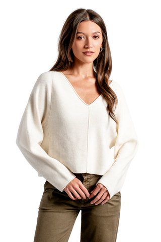 Kerisma Asima V Top in Cream featuring a V-neckline, relaxed cropped silhouette, and long sleeves.