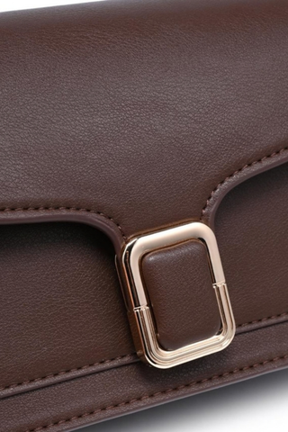 Urban Expressions Coco Crossbody in Espresso featuring a structured vegan leather silhouette, flap front, buckle detail, and detachable strap.