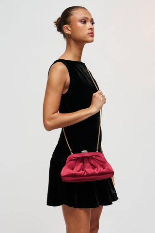 Urban Expressions Winter Clutch in Burgundy with soft pleating, polished metal frame, kiss-lock clasp, and slender chain strap.