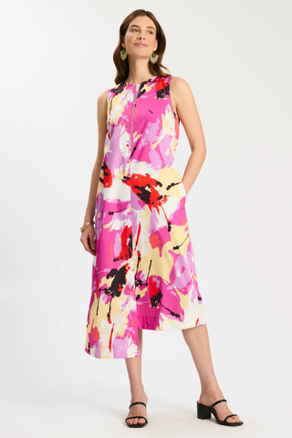 Model wearing Tyler Boe Cynthia Sleeveless Dress in Multi with colorful abstract print, asymmetrical hemline, and sleeveless silhouette