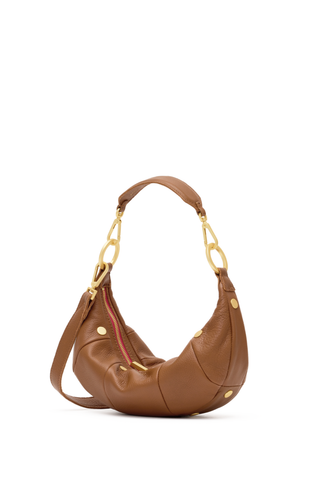 Hammitt Erica Sml Handbag in Mahogany Pebble featuring warm brown pebbled leather, brushed gold hardware, and a curved crescent silhouette.