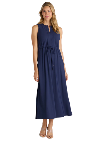 Woman wearing a navy blue dress on a white background