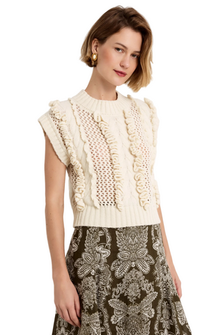 Marie Oliver Kennedy Top in Ivory featuring an open knit design, dimensional ruffle trim, crew neckline, and sleeveless cropped silhouette.