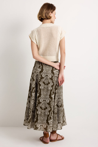 Marie Oliver Kennedy Top in Ivory featuring an open knit design, dimensional ruffle trim, crew neckline, and sleeveless cropped silhouette.