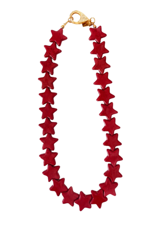 Smith & Co. Design Large Star Necklace in Red featuring oversized rich red star-shaped beads and a lobster clasp closure.