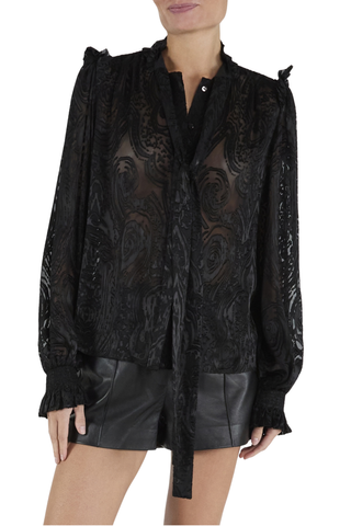 Ramy Brook Mara Top in black featuring a tonal paisley pattern, long sleeves, and feminine ruffle detailing.