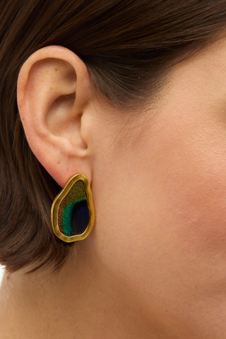 Brackish Amanda Large Organic Stud Earrings featuring vibrant green and blue peacock feathers framed in softly hammered 18k gold plating.