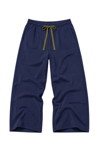 Kerri Rosenthal Weekend Barb Sweatpant in indigo blue featuring a wide-leg silhouette, elastic waistband, and embroidered heart detail.