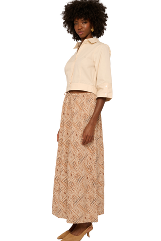 Love the Label Beckett Top in cream featuring a collared neckline, button front, cropped silhouette, and 3/4-length sleeves.