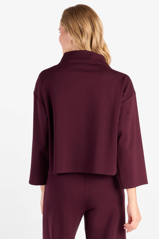 Jude Connally Marisa Top in Merlot featuring a relaxed silhouette, funnel neckline, and long sleeves.