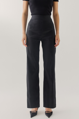 Hutch Thompson Pant in Black featuring a high-rise waist, tailored fit, and elegant wide-leg silhouette.