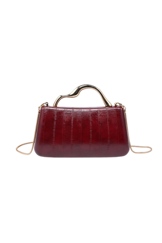 Rue Aveline Nichelle Clutch in Burgundy featuring textured vegan leather, a structured frame silhouette, gold-tone top handle, and removable chain strap.
