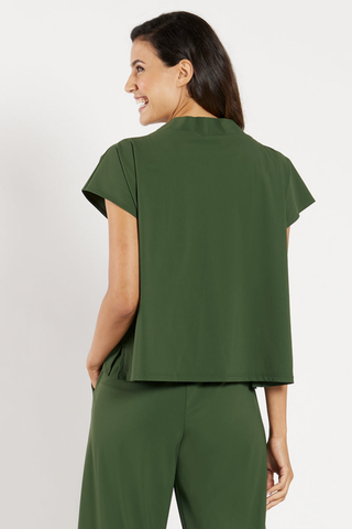 Model wearing the Jude Connally Tillie Top in Loden with a relaxed silhouette and cap sleeves.