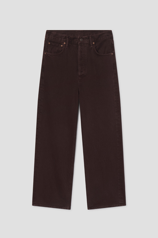 Model wearing the AGOLDE Ren Jean in Sloe Berry featuring a high-rise waist, cropped wide-leg silhouette, and rich dark grape denim with warm brown undertones.