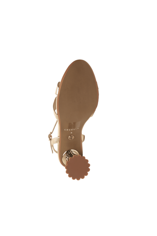 Cecelia New York Peter Heel in soft gold metallic leather with a sculptural fluted block heel, ankle strap, and rounded open toe.