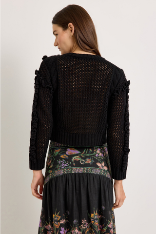 Marie Oliver Lindsay Sweater in Black featuring open-knit detailing, sculptural ruffles, and a classic crew neckline.