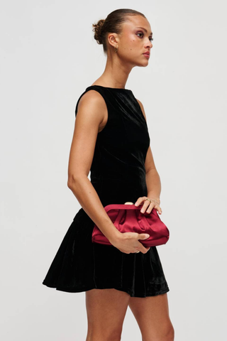 Urban Expressions Winter Clutch in Burgundy with soft pleating, polished metal frame, kiss-lock clasp, and slender chain strap.